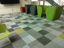 Mix of various colors of Interface Transformation Carpet Tiles Transformation
